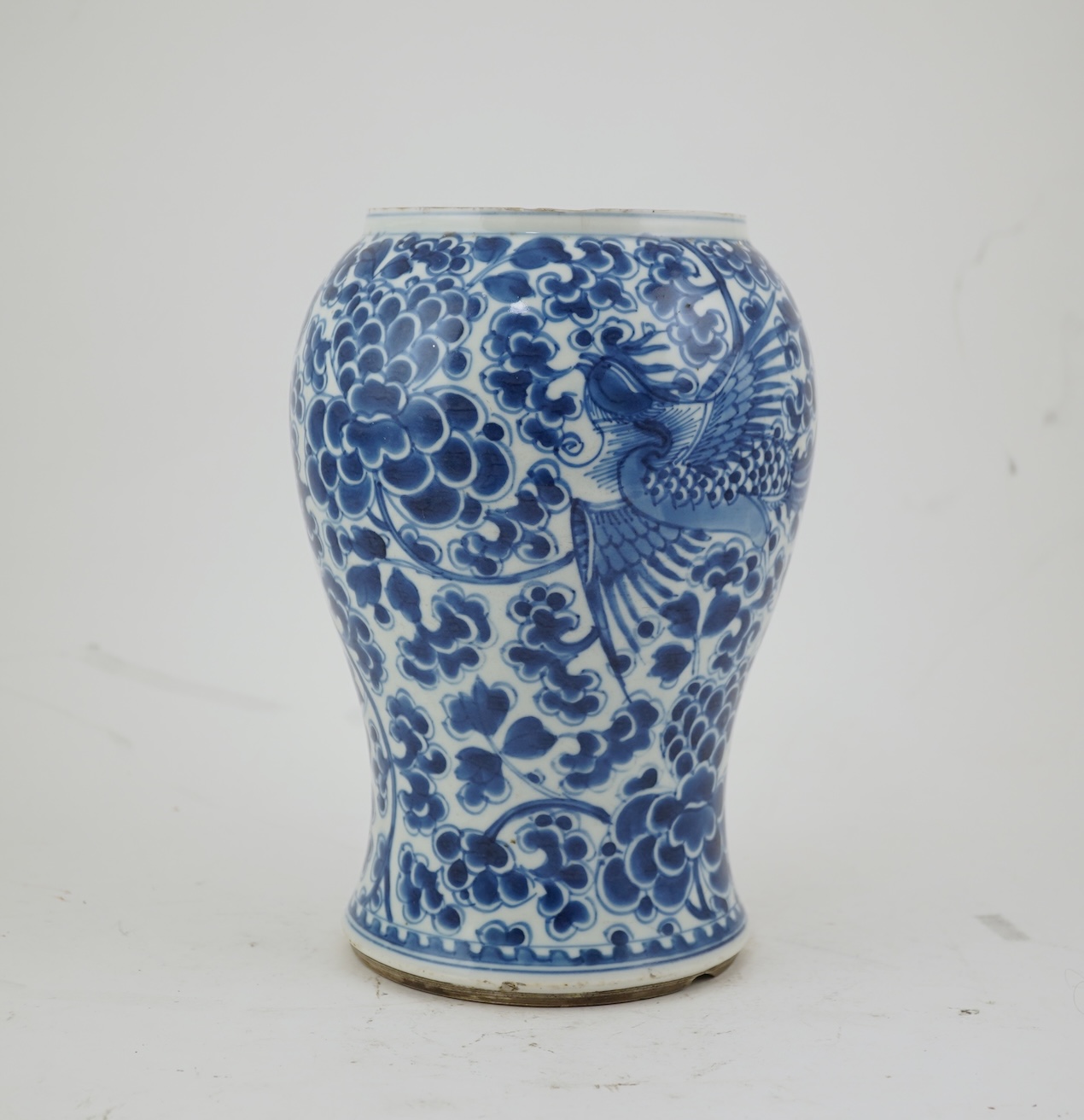A Chinese blue and white ‘phoenix and peony’ baluster vase, Kangxi period